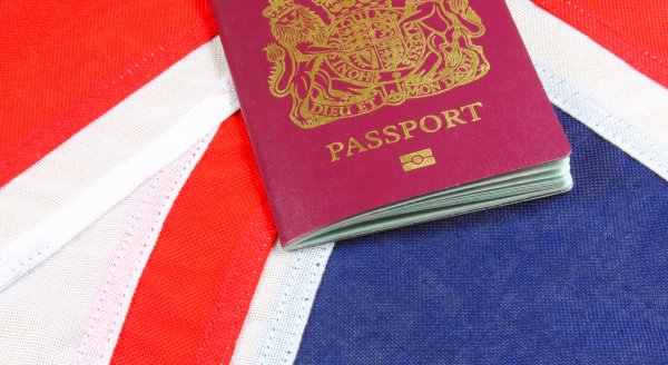 A passport on the Union Jack, UK flag