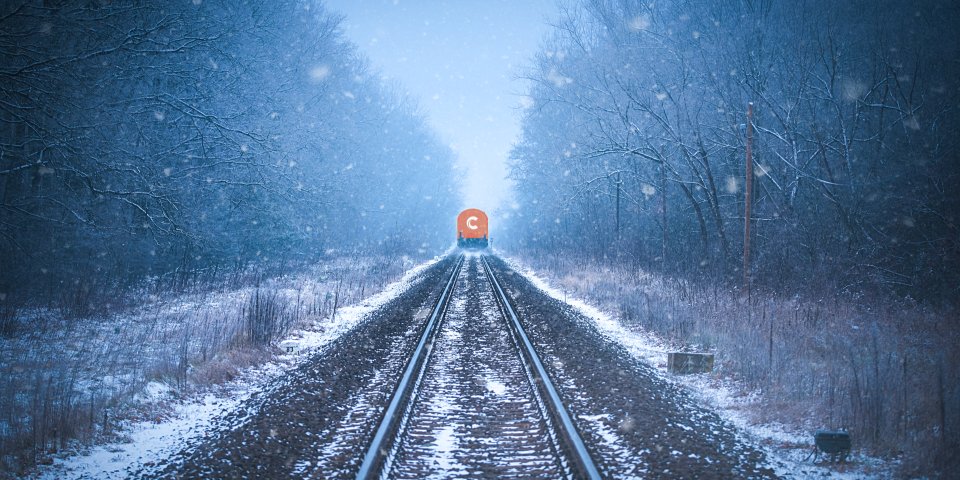 Train tracks in winter mist